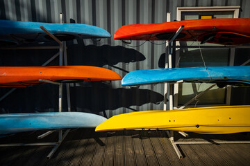 City SUP station offering paddleboard rental for water recreation on urban rivers and canals. Stand up paddleboarding, recreation travel, water equipment hire, active leisure, tourism business