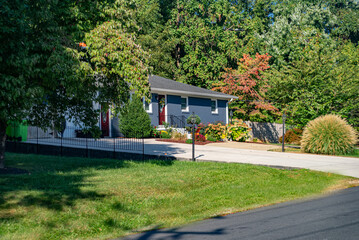 Peaceful Countryside Home with Manicured Lawn and Shrubs