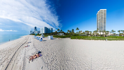Sunny Miami Beach with Ocean View and Modern Skyline in the Background