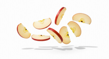 Crisp fresh red apple slices floating on white background