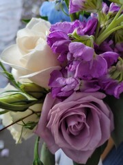 wedding bouquet of flowers in white and purple