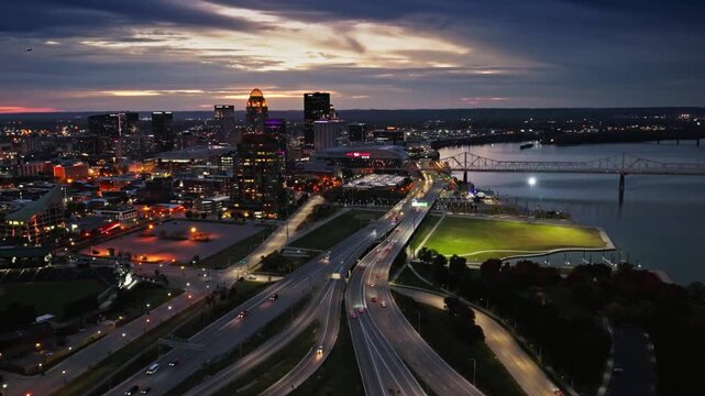 Night view of louisville skyline and the ohio river, kentucky, usa