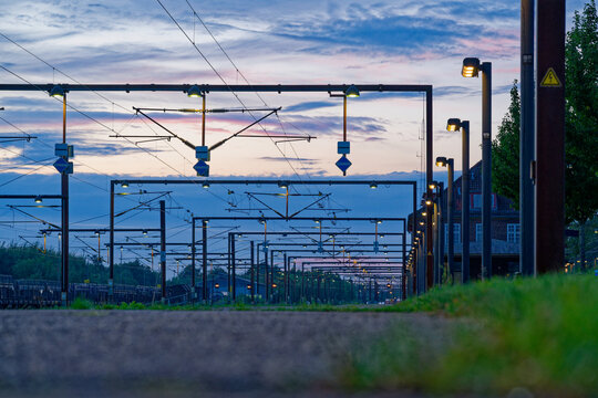Rows of catenary gantries forming a dense station lattice in Padborg, Denmark
