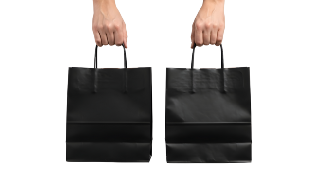 Two black shopping bags held by hands isolated on black background on transparent background - Powered by Adobe