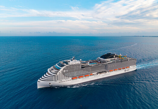 Miami, Florida, USA - May 10, 2025: Cruise ship tour and travel at sea. Ship leaving port. Sea journey. MSC World America cruise ship voyage. Cruise in summer vacation. MSC cruises cruise line