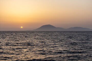 Fototapeta premium Evening sun above Cephalonia island, Greece
