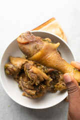 Overhead view of juicy cooked chicken, top view of cooked chicken on a white background