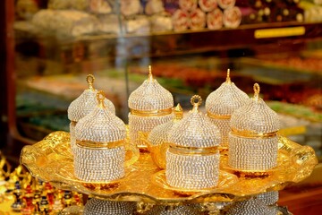 Crystal Stone Gold Coffee Cup and Turkish Delight Cup Set. Ottoman stone coffee cups and Turkish delight cups. Gold tray, cups. Vintage. Gift cup set in the Grand Bazaar. Gift shop. Istanbul - Turkey.