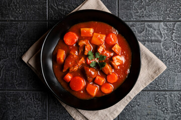 Goulash or Gulasch. Meat stew with carrot, potato, and spices.