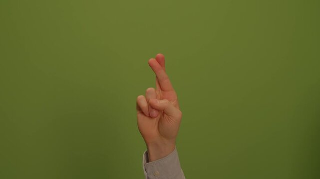 The Fingers Crossed Gesture symbolizes hope and good fortune during challenging times