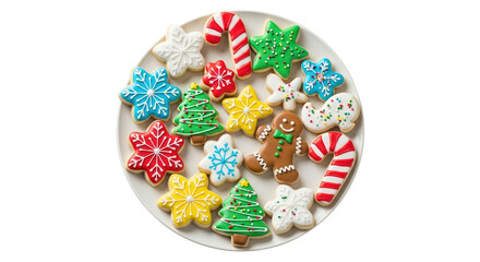 A plate full of assorted christmas decorated cookies including gingerbread men, candy canes, and trees, isolated on transparent background