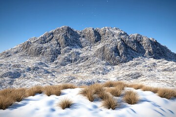 Snowy mountain range under a clear blue sky