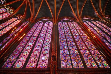 Wonderful stained glass windows inside the Sacred Chapel next to Notre Dame Cathedral on the Ile de la Cite, Paris, France.