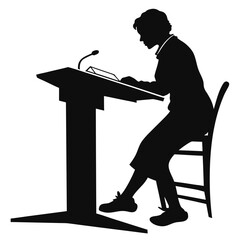 Teacher sitting at desk silhouette