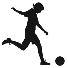 Teenager kicking soccer ball silhouette