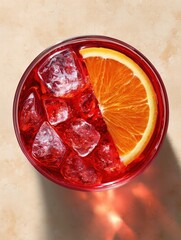 Top-Down View of Campari Spritz in Round Glass with Large Ice Cubes and Orange Slice, Vibrant Red Drink on Minimalist Beige Background, Soft Natural Lighting