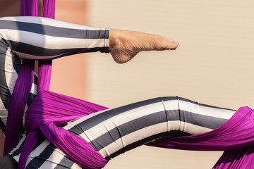 Aerial Silk Acrobat Leg in Striped Costume