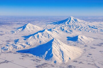 Aerial view of snowy volcanic peaks