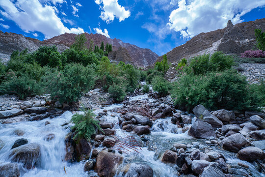 Hidden deep in Ladakh&rsquo;s rugged terrain, a waterfall flows powerfully through the mountain rocks. This natural wonder offers serenity, seclusion, and the sound of crashing water echoing through stone.
