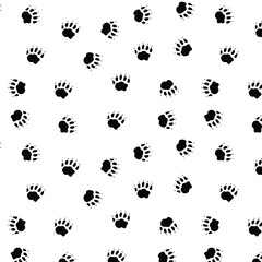 Seamless pattern with badger pawprint in black color with transparent square background