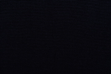 Background texture of dark blue woven fabric for wear made of soft cotton