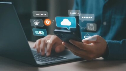 The concept of cloud computing and global data networks. A professional's hand using a laptop and smartphone, connected to various cloud service icons such as data storage, security, and connectivity - Powered by Adobe