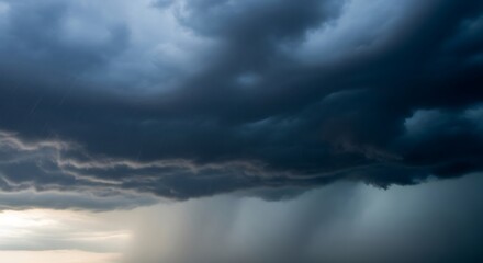 Dramatic storm clouds fill the sky, showcasing dark hues and heavy rainfall.