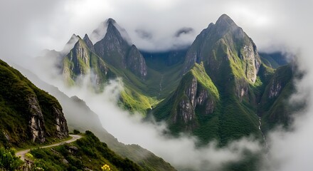 A breathtaking mountain range enveloped in a misty atmosphere, showcasing rugged peaks and lush valleys.