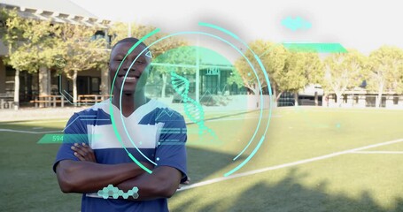 Male athlete standing center field DNA overlay appearing over torso cycling data for sports tech - Powered by Adobe