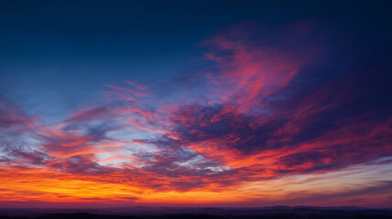 Obraz premium Colorful sunset sky with vibrant clouds over horizon