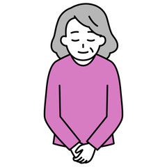 お辞儀をする年配の女性