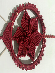 Handmade Macrame Wall Hanging with Intricate Floral Design.