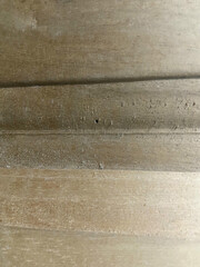 Close-up of weathered wooden planks with visible texture and grain.
