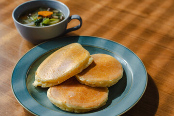 Homemade pancakes with soup for breakfast
