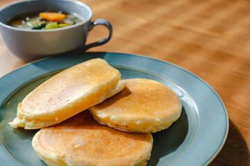 Homemade pancakes with soup for breakfast
