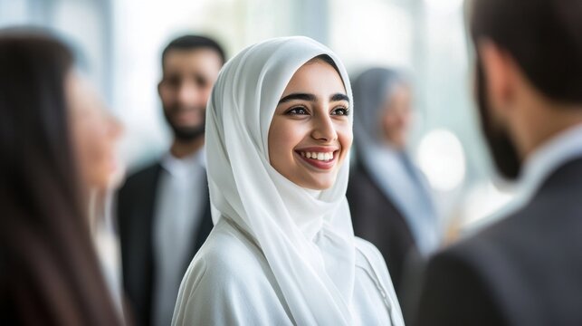 Group four people meeting center there is young Dubai business woman talking