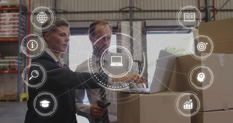 Manager pointing at warehouse shelf, logistics analyst verifying inventory on laptop with overlay - Powered by Adobe