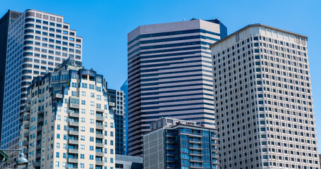 Fototapeta premium Cityscape of skyscraper building in business district. City architecture of skyscraper. City building cityscape view. Skyscraper cityscape. Modern city downtown. Business city