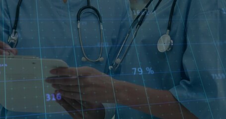 Hand hovering starting data overlay change while healthcare team swipes tablet showing analytics - Powered by Adobe