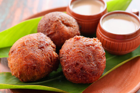 Indian snack Kerala food bonda made from wheat flour  and milk tea undampori 