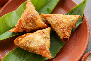 Samosa crunchy triangular shaped wraps stuffed with spicy vegetables. Cocktail mini triangle Kerala...