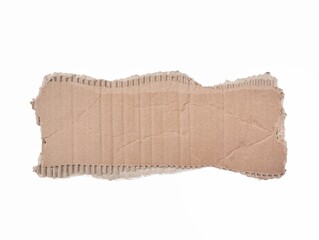 Torn corrugated cardboard piece isolated on white background. Element for creative design 