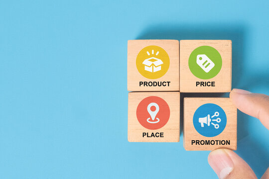 4Ps, Product, Price, Place, Promotion, text on wooden cube blocks on grunge grey background including copy space for marketing strategy concept