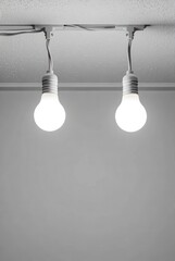 Illuminating light bulbs indoor setting photography minimalist design ceiling viewpoint modern concept