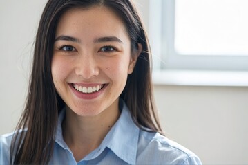 Smiling young woman indoor setting portrait photography natural lighting close-up happiness concept
