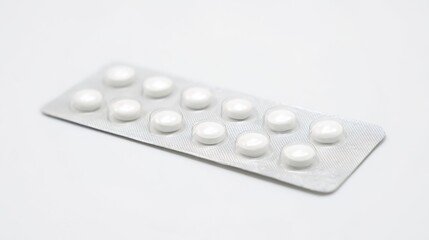 White Tablets of Various Dosage Forms Spilling Out of a Medicine Bottle: A Visual Link to Daily Health Management and Medication Accessibility for Wellness Maintenance