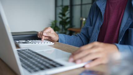 Business man accountant financial analyst and auditor working and laptop for calculating 