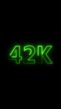 Bright Green Neon 42 K Text Glowing on Black Background forty two thousand number