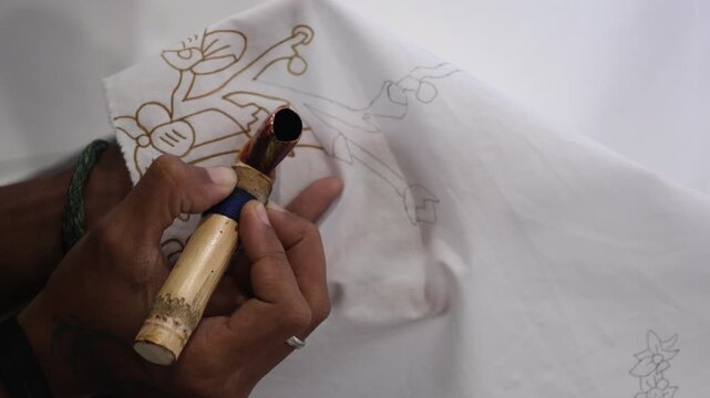 4K batik . Making batik tulis. The technique of making batik by writing using a canting tool. Canting consists of nyamplung, cucuk, gagang or hand
