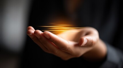 Gentle Hand with Conceptual Light Representing Innovation and Hope